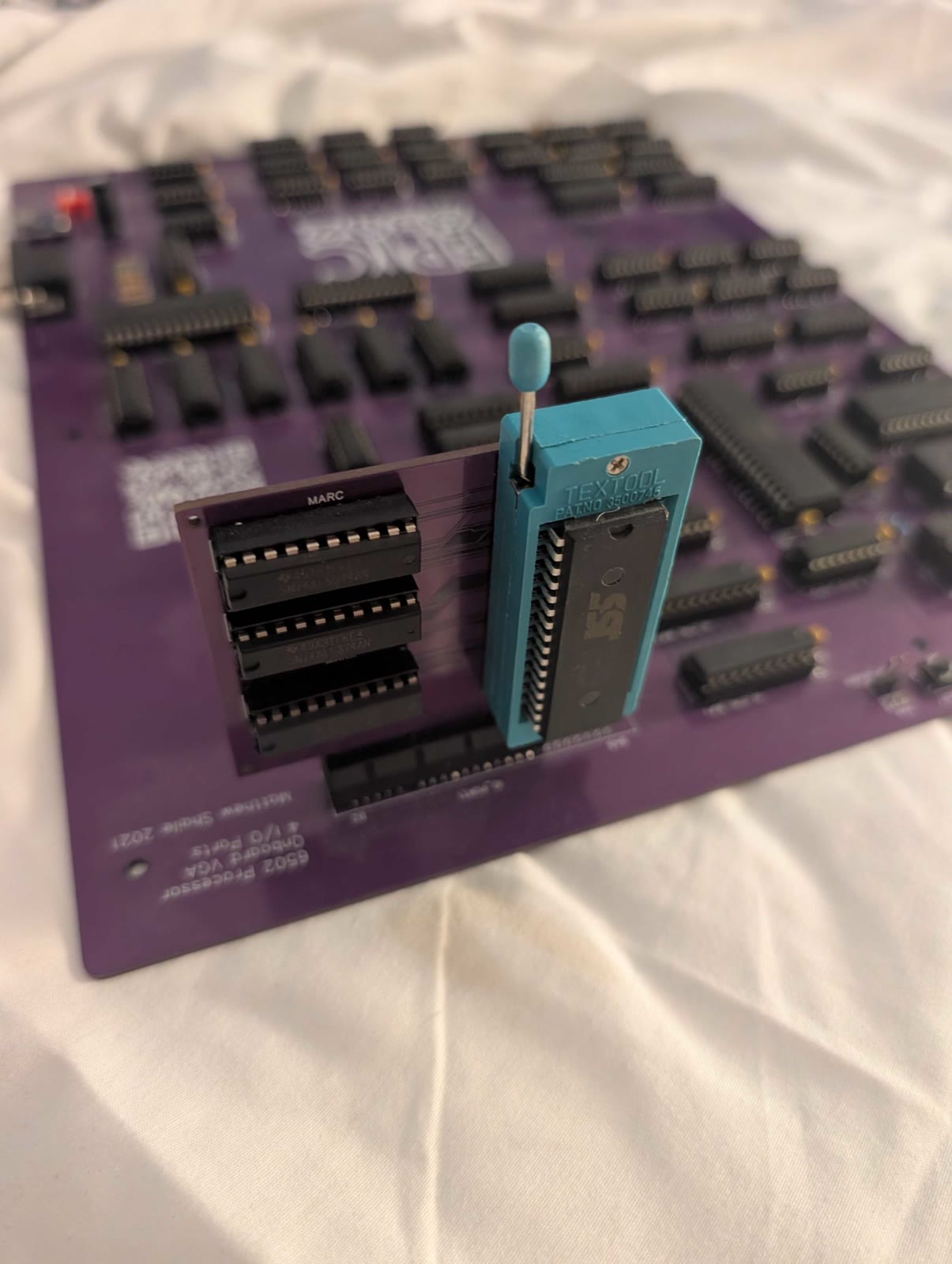The cartridge plugged into one of the board's I/O ports